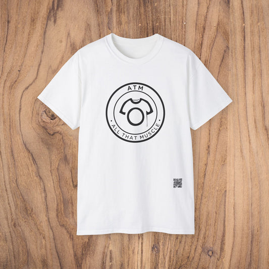 White t-shirt with black graphic design on a wooden surface