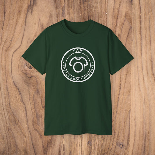 Green t-shirt with a white logo on a wooden surface